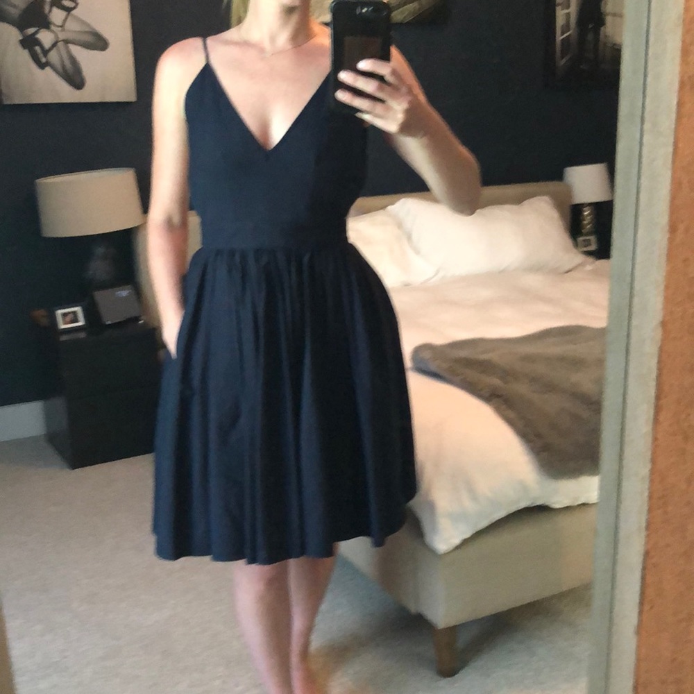 Contrarian navy bib dress with pockets